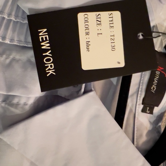 A338  Nancy  Light Blue  Sculpted Flower Detail Blouse  Oversized Fit, NWT  M - Picture 3 of 5